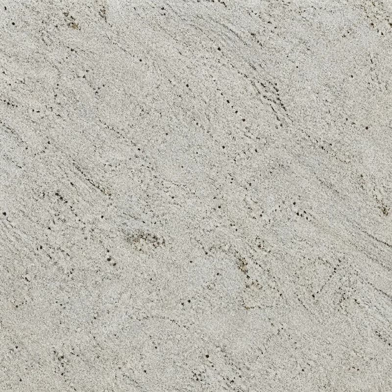 Visualización de material con IA del granito Colonial White con campo granular blanco crema, movimiento gris pálido y puntos minerales borgoña dispersos.. Visualización de diseño con IA.