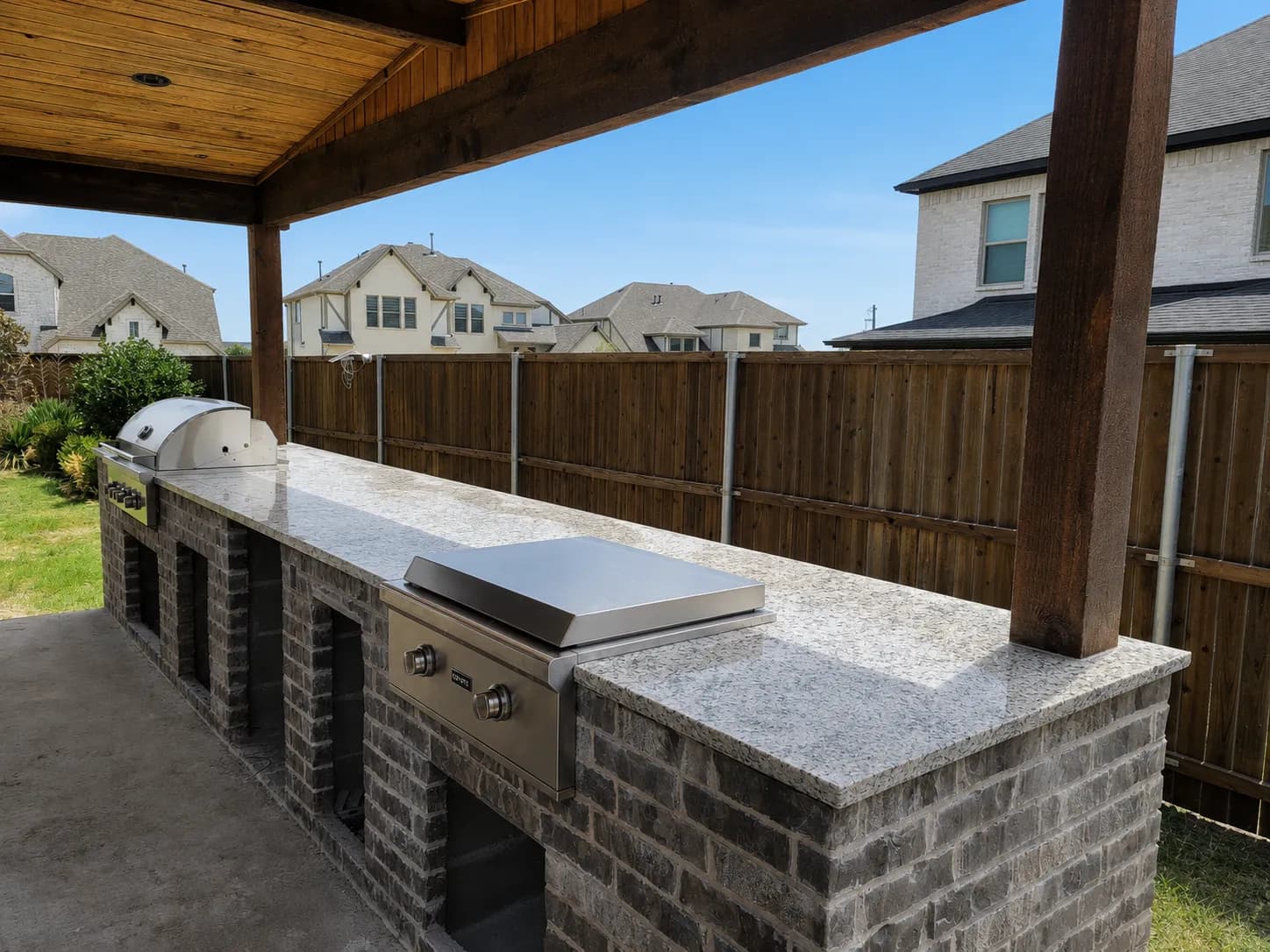 Speckled gray granite outdoor kitchen and grill counter