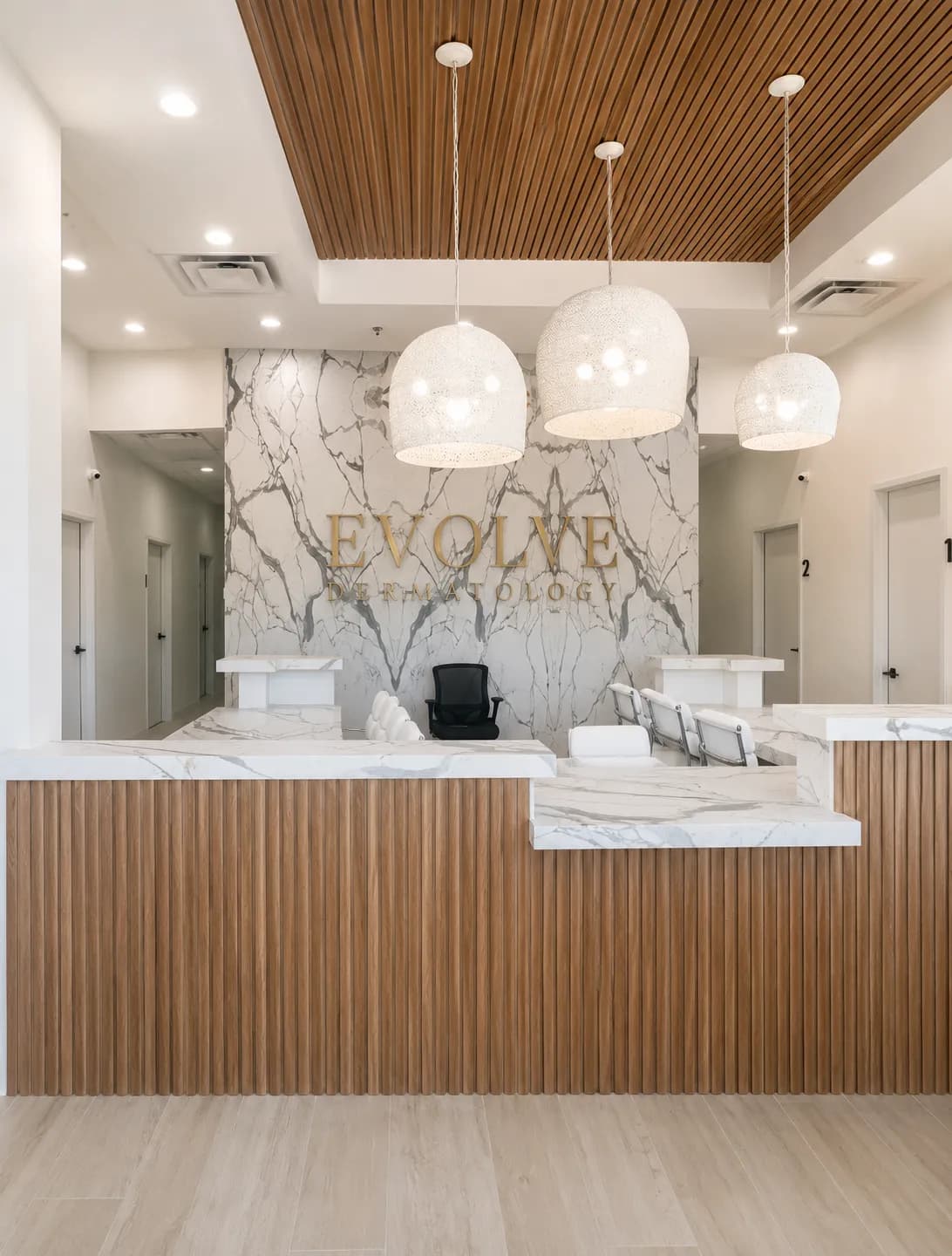 Marble reception desk with waterfall edge