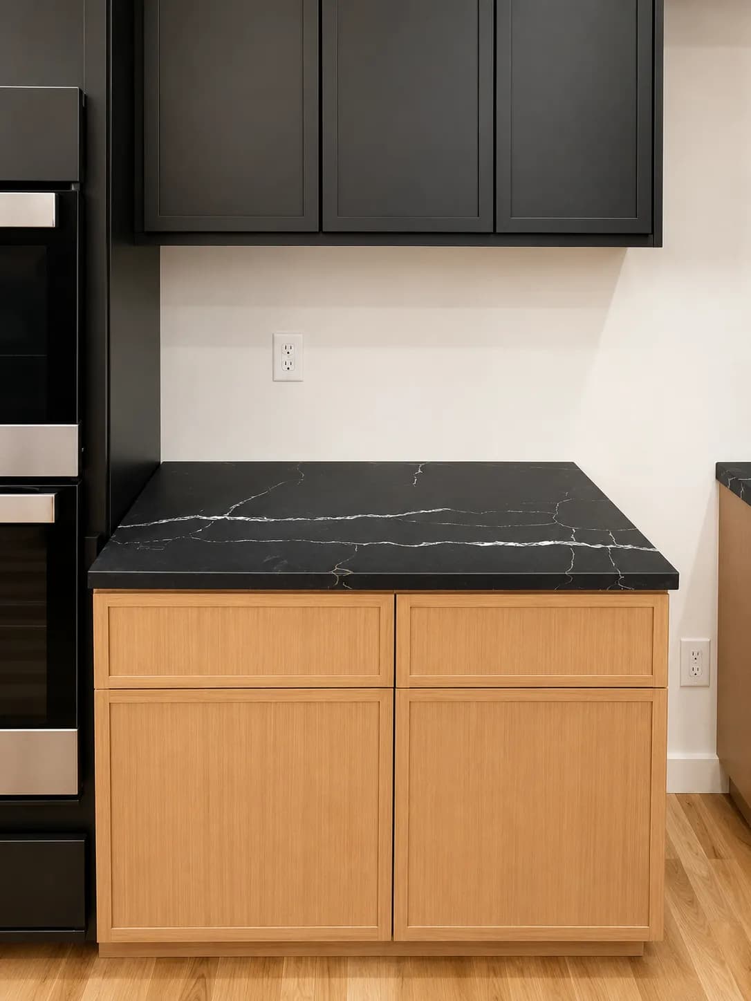 Black quartz countertop with seamless edge detail