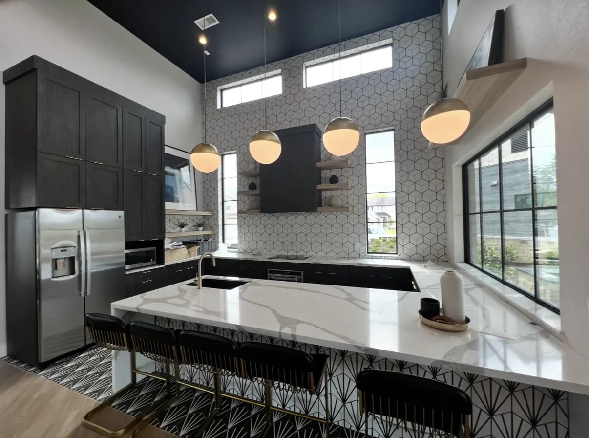 Open clubhouse kitchen with veined white quartz